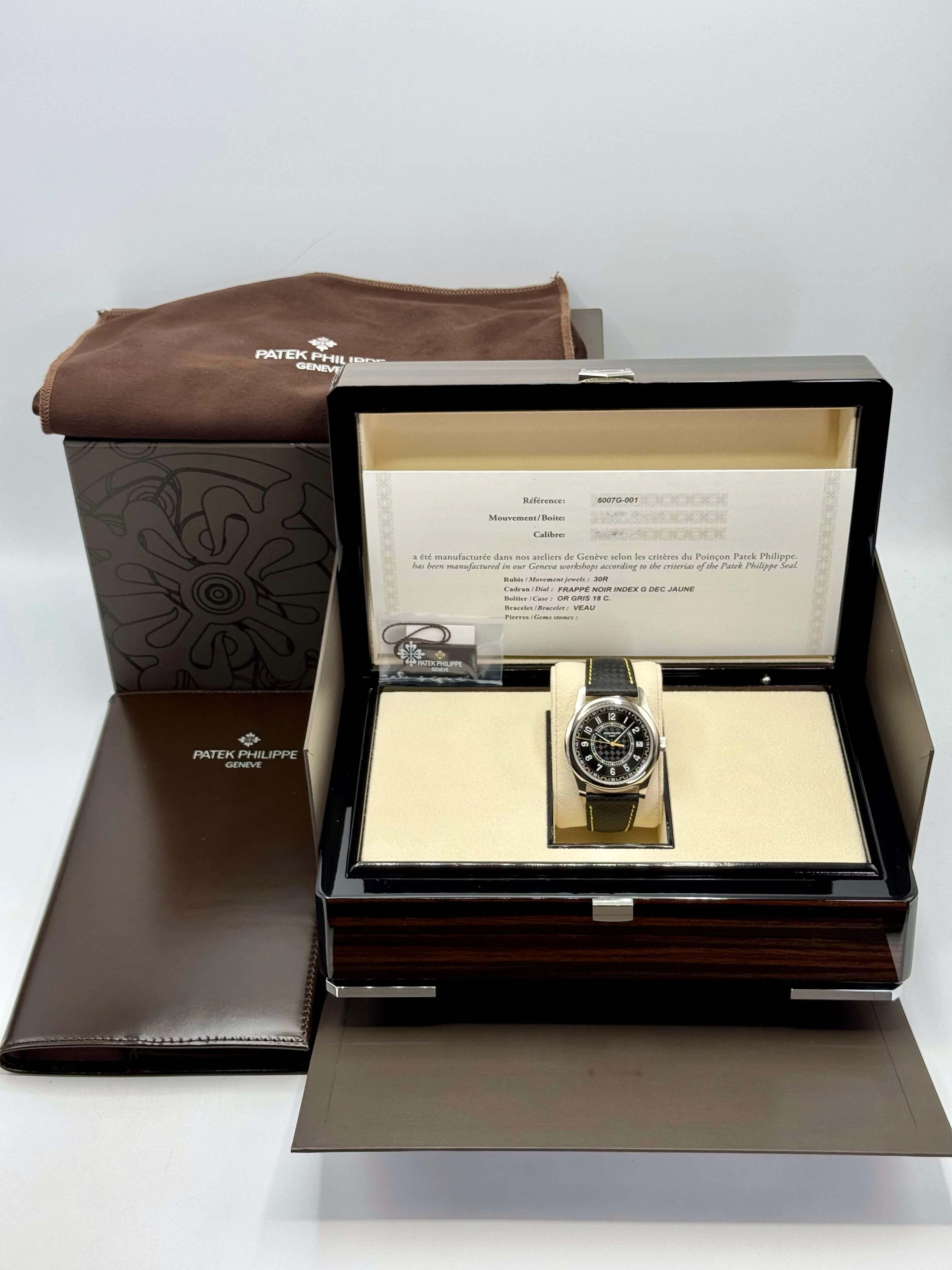 NEW 2024 Patek Philippe Calatrava 40mm 6007G White Gold Black Dial Yellow - Image 9
